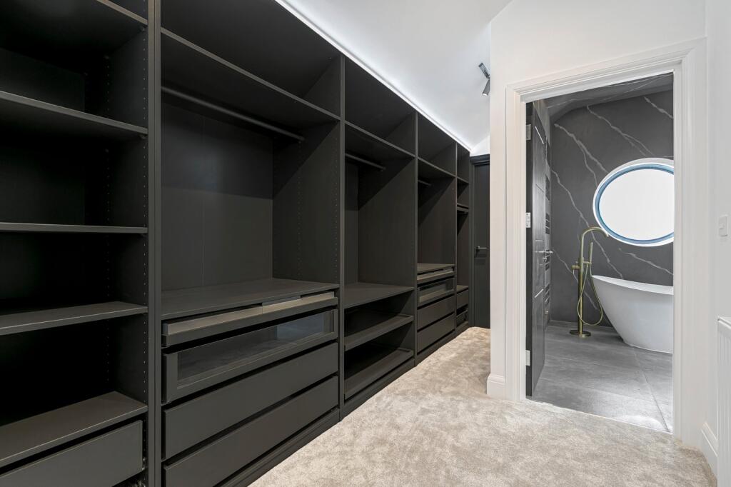 property in Grand Drive, 
Raynes Park, SW20