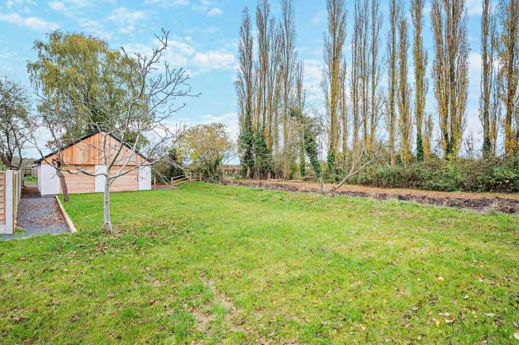 Rear garden towards the carport