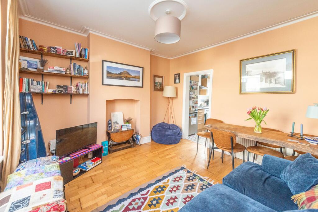 SITTING ROOM AND DINING KITCHEN