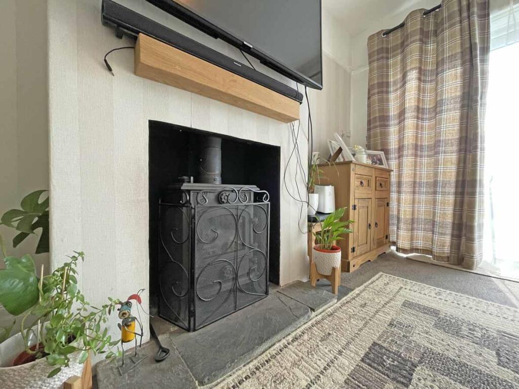 Laira Park Road 31 - New Lounge Fireplace.jpg