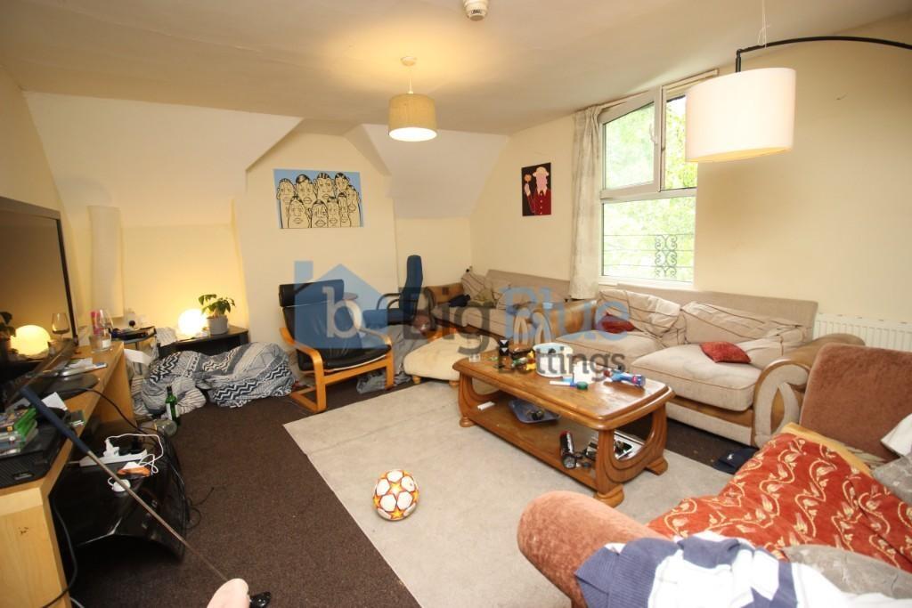 Cozy and inviting living room with ample seatin...