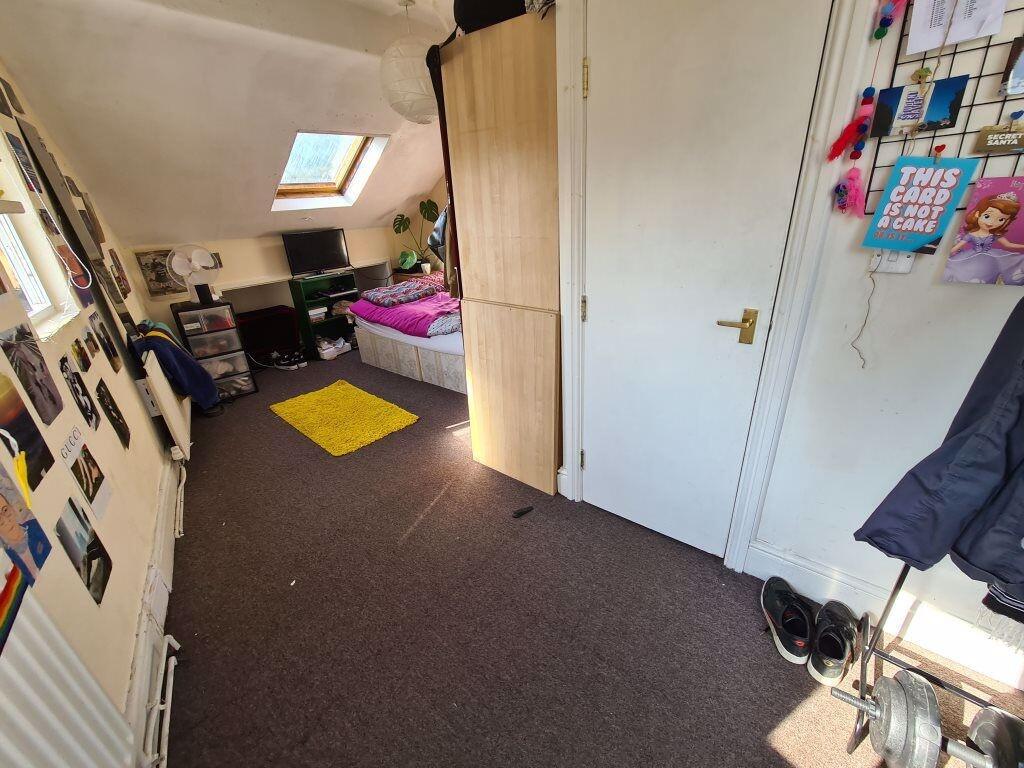 A compact and tidy single toilet room featuring...