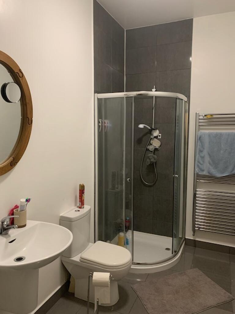 A modern and well-maintained bathroom featuring...