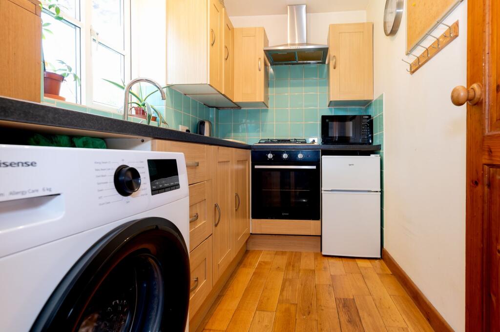 KITCHEN, DINER AND LIVING ROOM