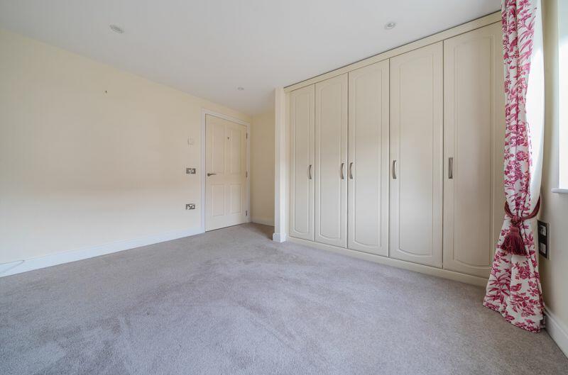 Bedroom with fitted wardrobes