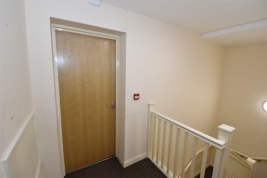 Front door and communal stairs.jpg