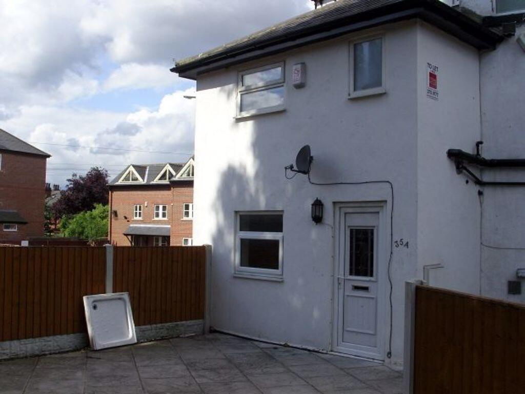 Front view of a well-maintained semi-detached h...