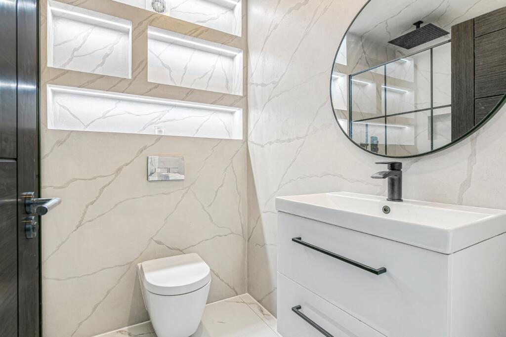 property in Grand Drive, 
Raynes Park, SW20