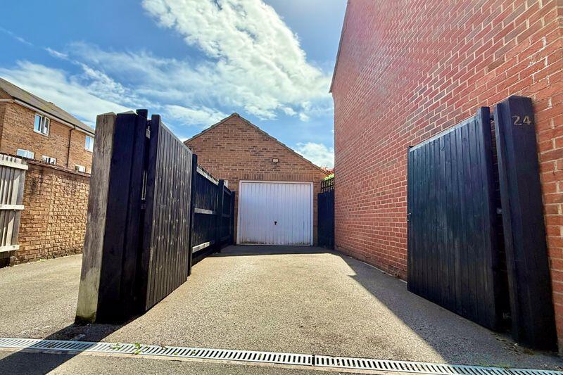 Gated Drive to Garage