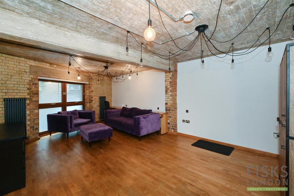 studio purple sofa.jpg