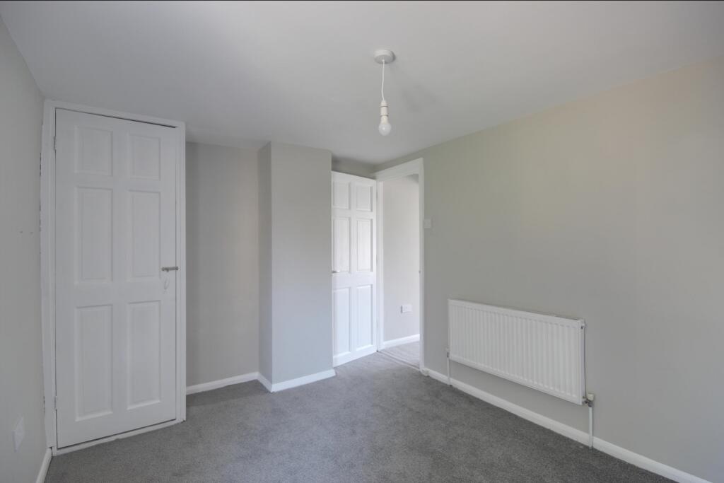 Bedroom 2 with storage and boiler 