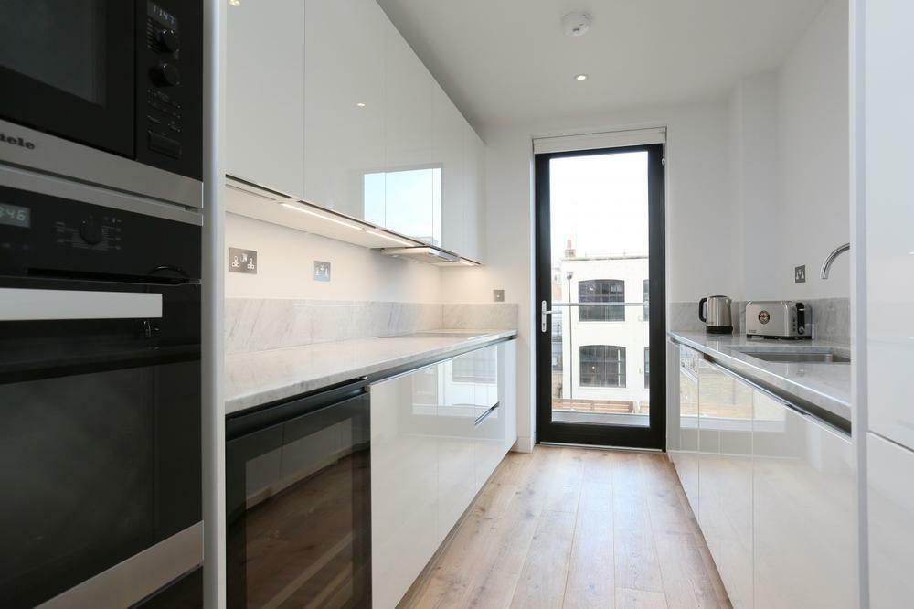Kitchen leading to balcony