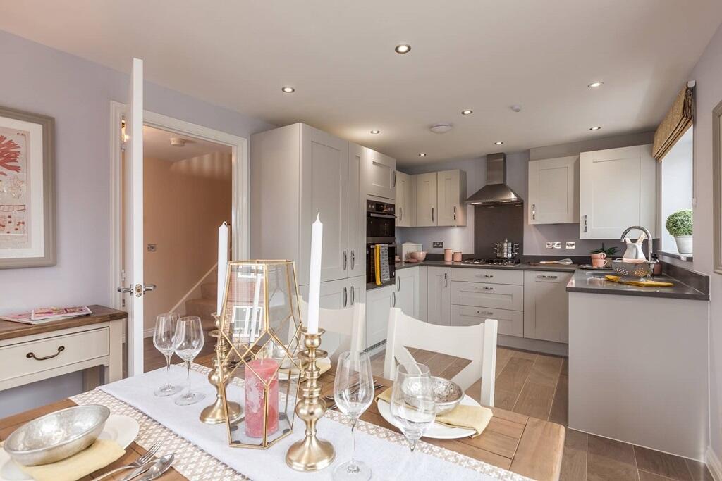 An open-plan kitchen/dining area perfect for entertaining