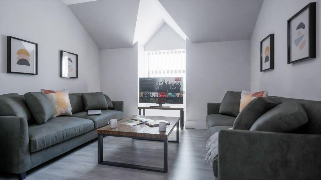 This contemporary living room features spacious...