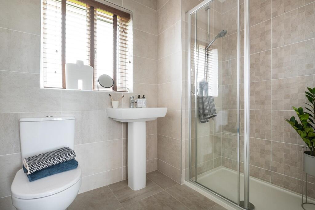 Create your own sanctuary in the en suite shower room