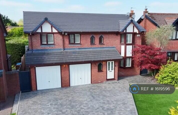 Front Aspect And Driveway