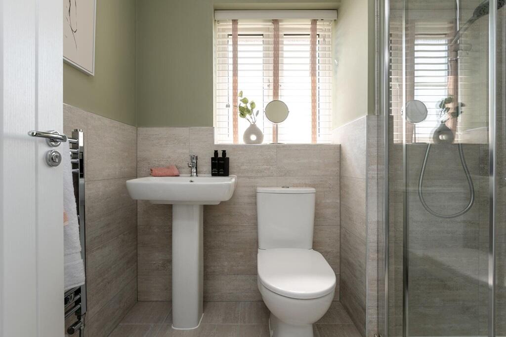 The main bedroom boasts an energy-efficient shower room