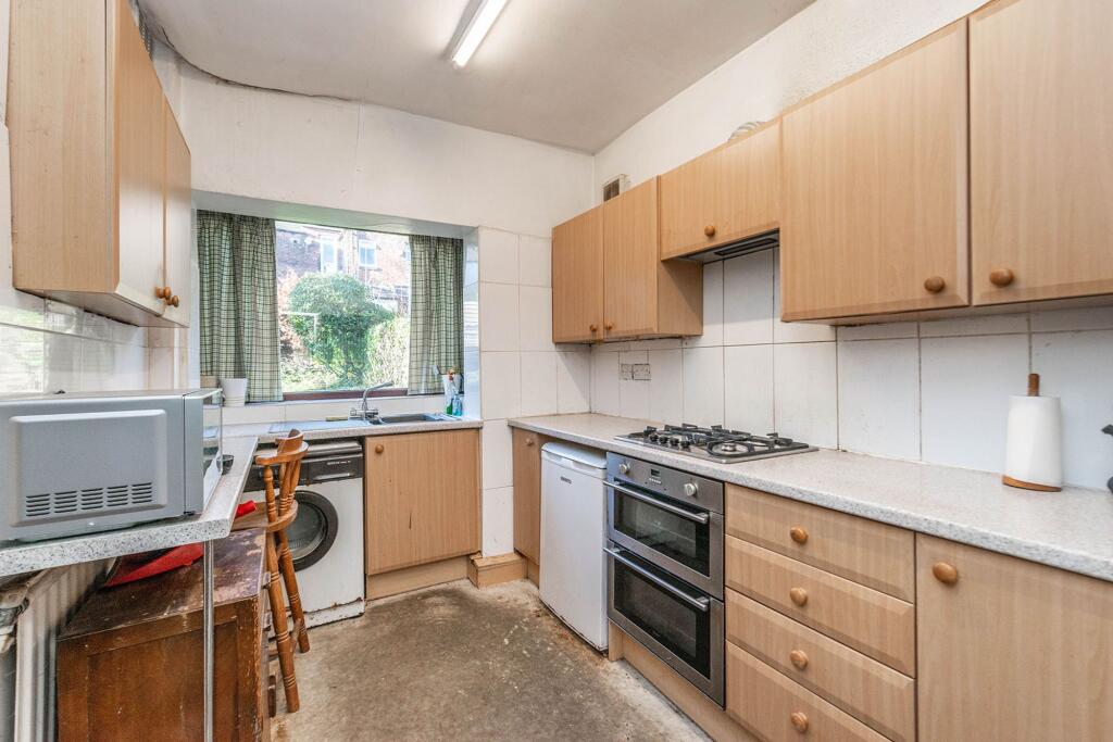 KITCHEN, DINING AREA AND LOUNGE