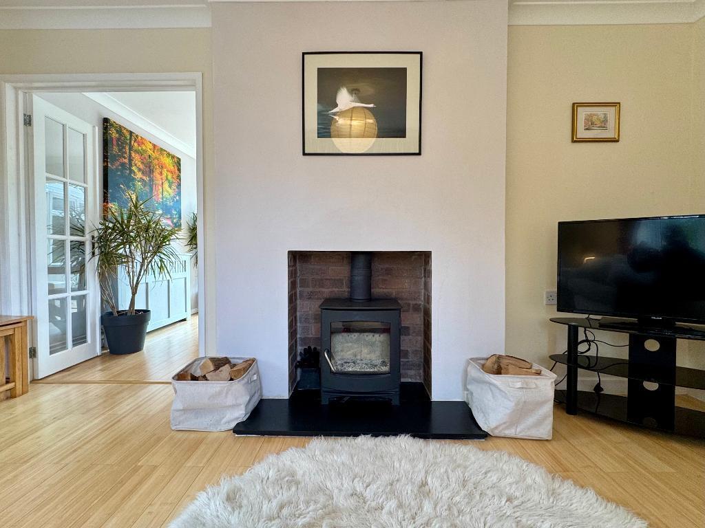 Cosy log burner and sitting room