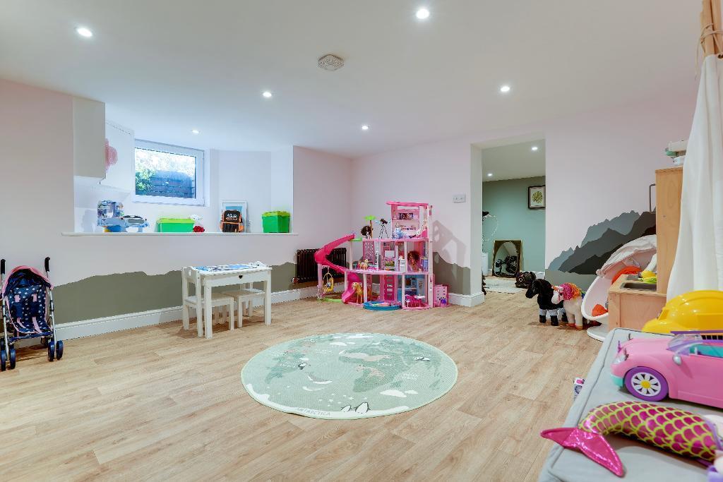 Playroom, teenage room, lower ground