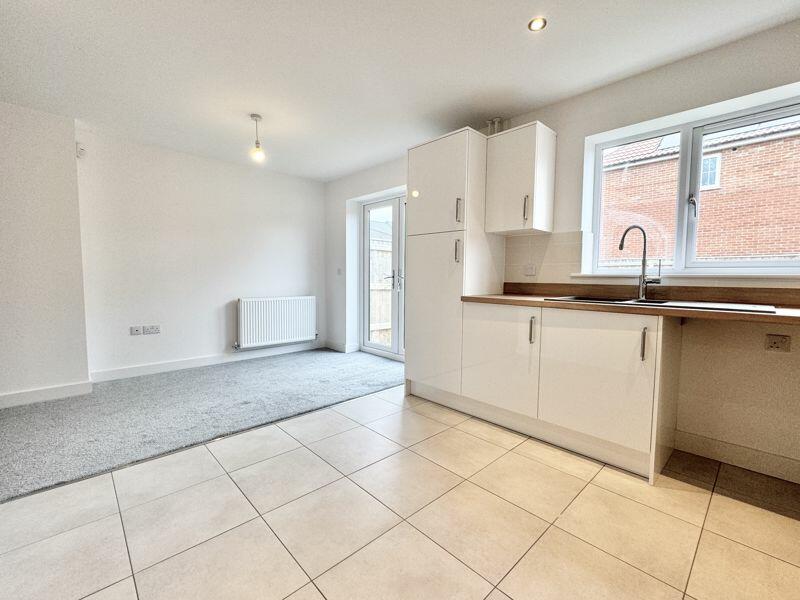 Kitchen through Dining Area