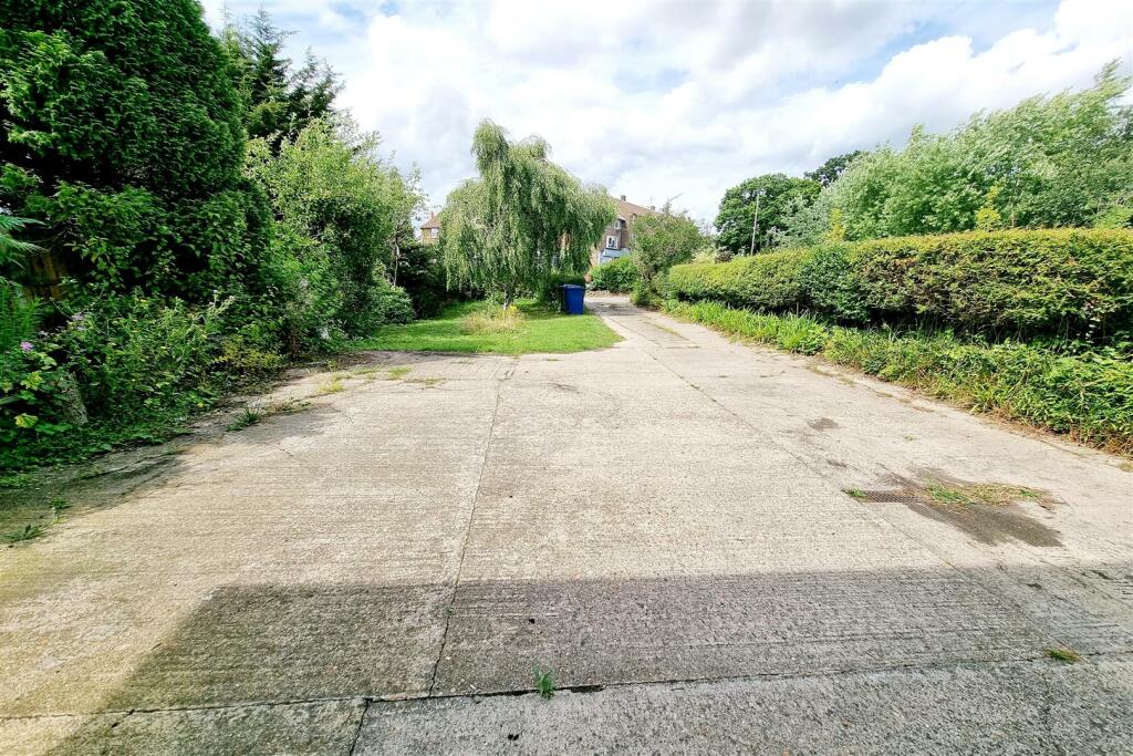 AMPLE OFF STREET PARKING TO FRONT: