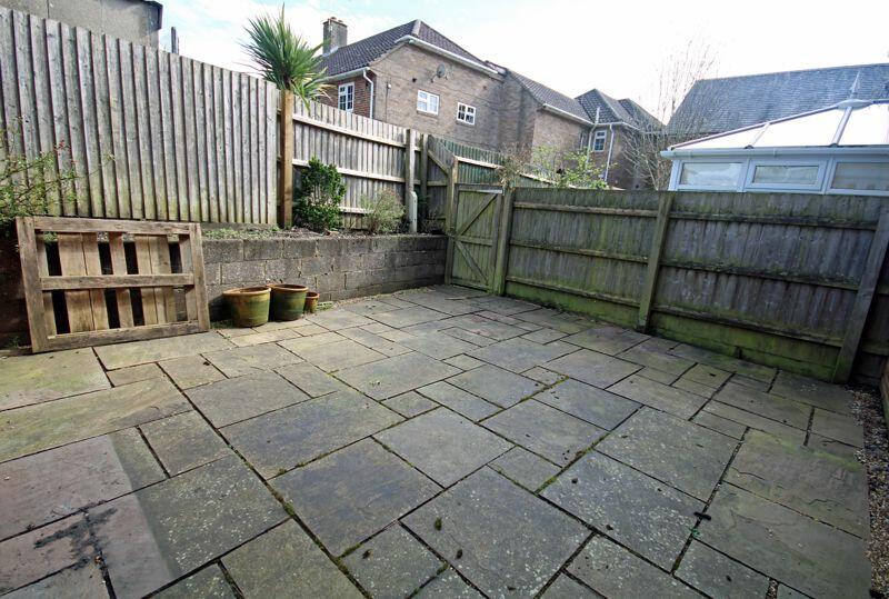 Paved garden with pedestrian access