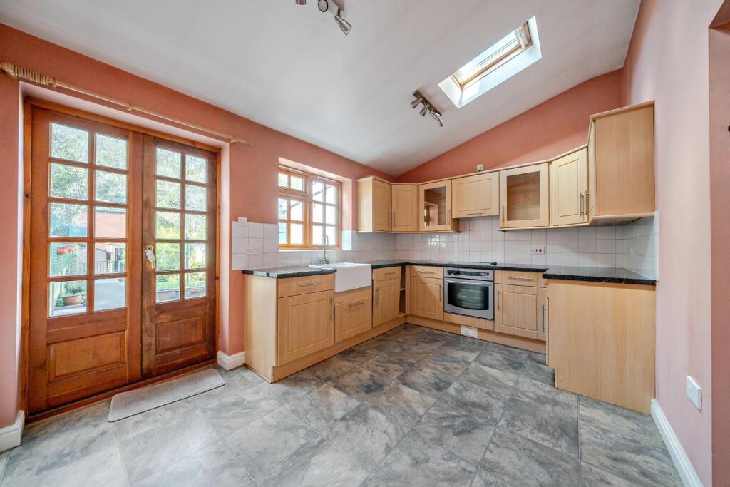 Kitchen with doors to garden.jpg