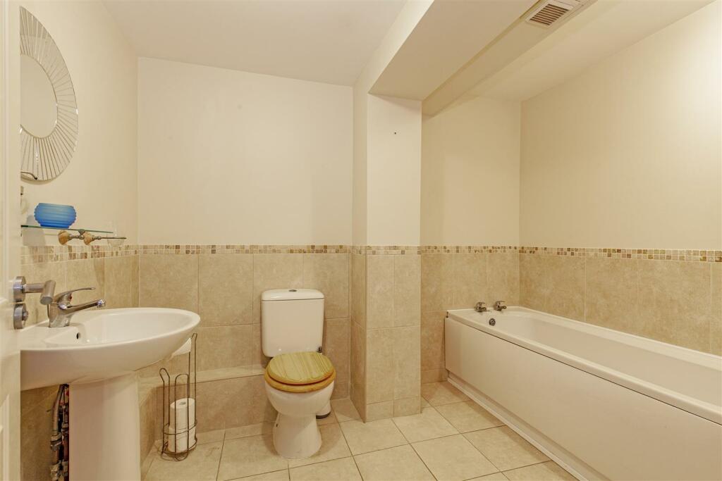 Spacious Partly Tiled Bathroom
