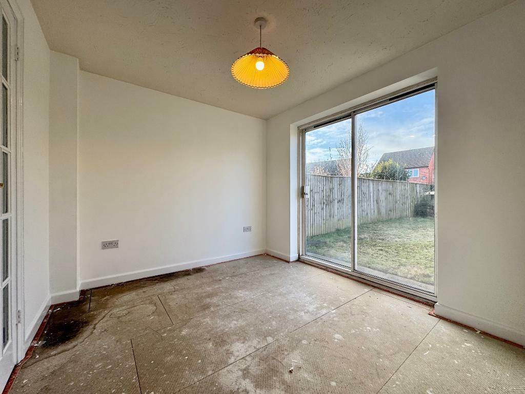 Dining room with patio doors
