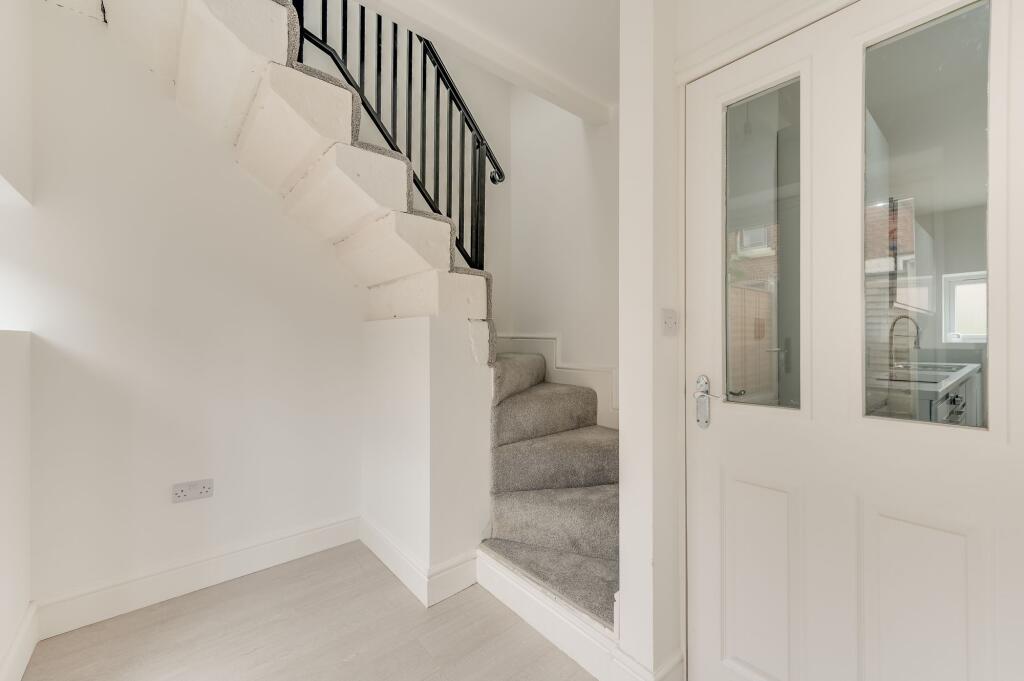 ORIGINAL STONE FLOATING STAIRCASE AND LANDING