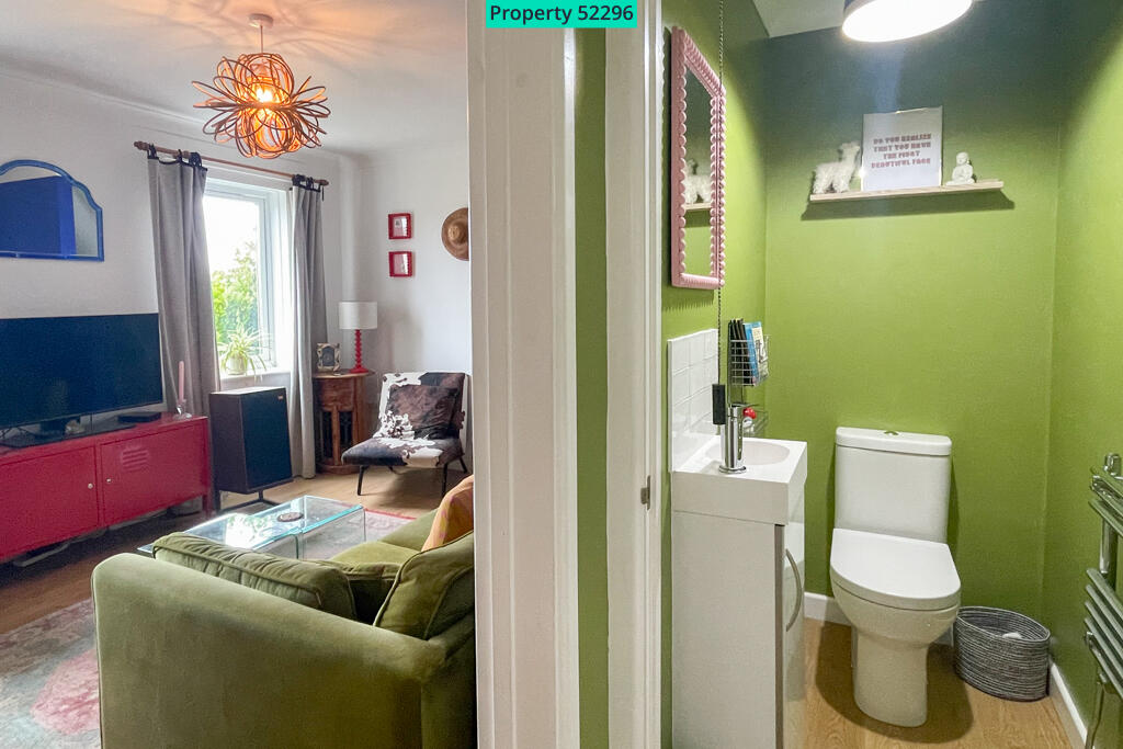 Entrance towards living room and downstairs W.C