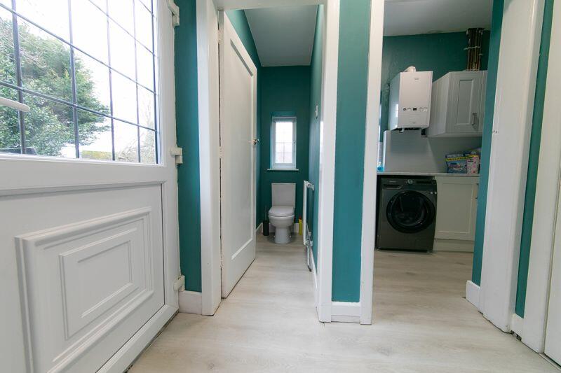 Utility, W.C. &amp; rear porch