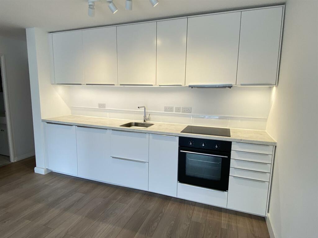 Open plan entrance, lounge and kitchen