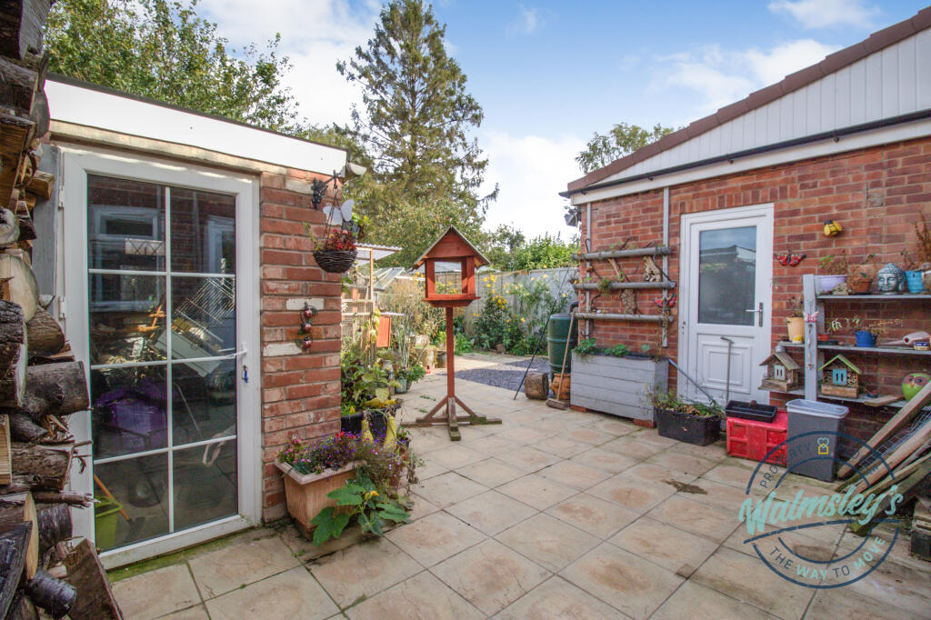 Rear patio &amp; brick built storage