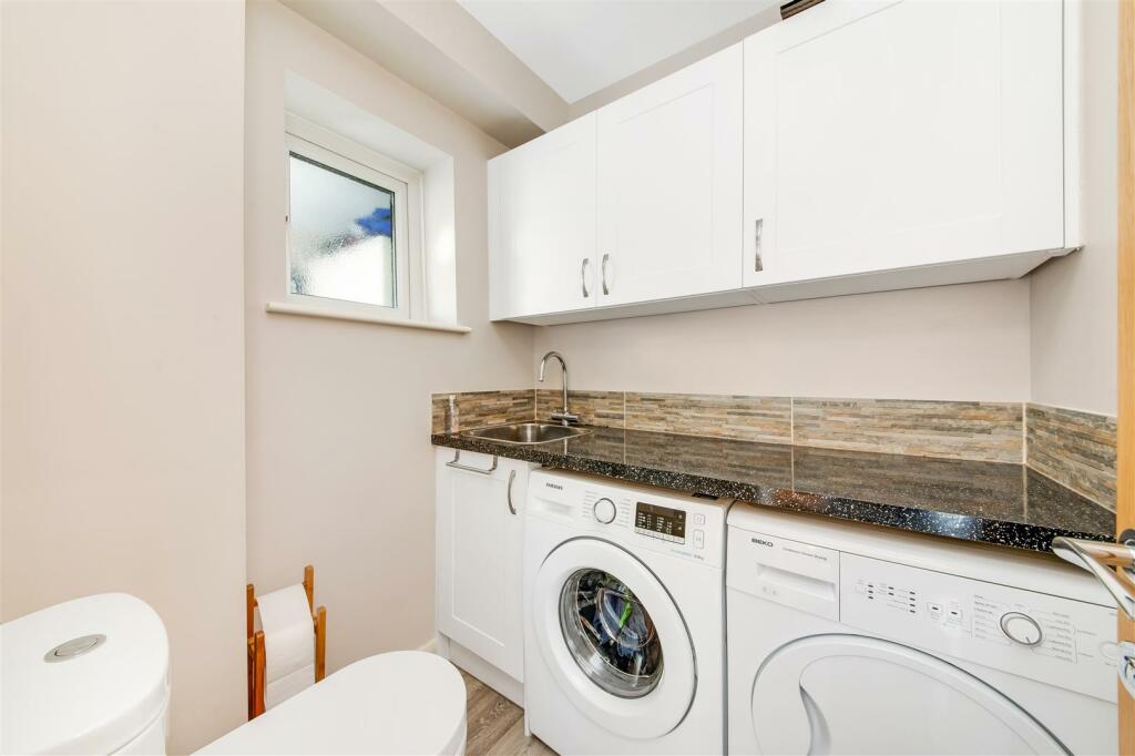 DOWNSTAIRS W.C/UTILITY ROOM