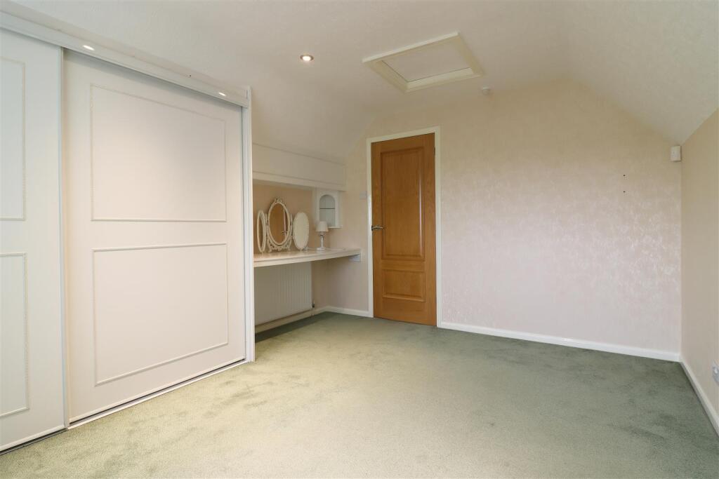 Front Double Bedroom One