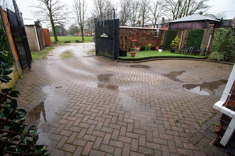Rear Garden and Gated Driveway