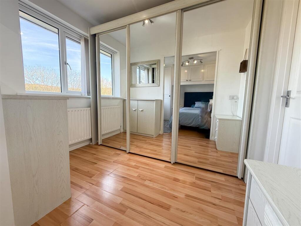 BEDROOM ONE WITH DRESSING ROOM