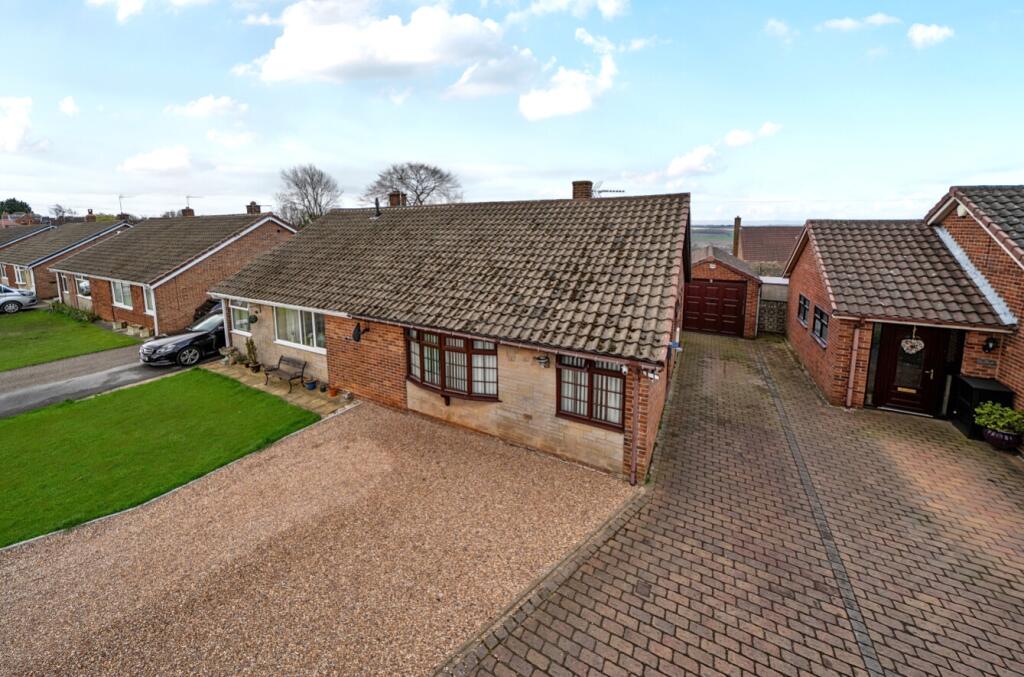 Elevated View of Bungalow and Driveway