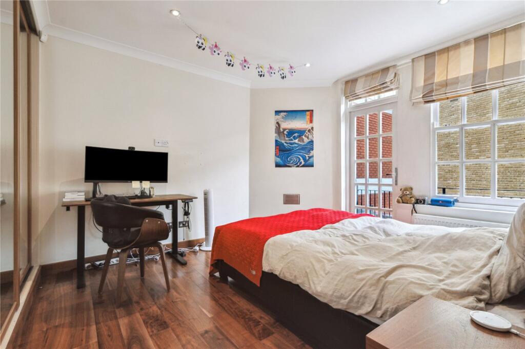 Bedroom With Balcony