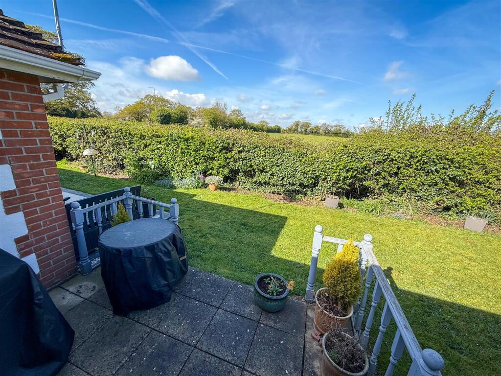 OUTSIDE - PRIVATE REAR PATIO