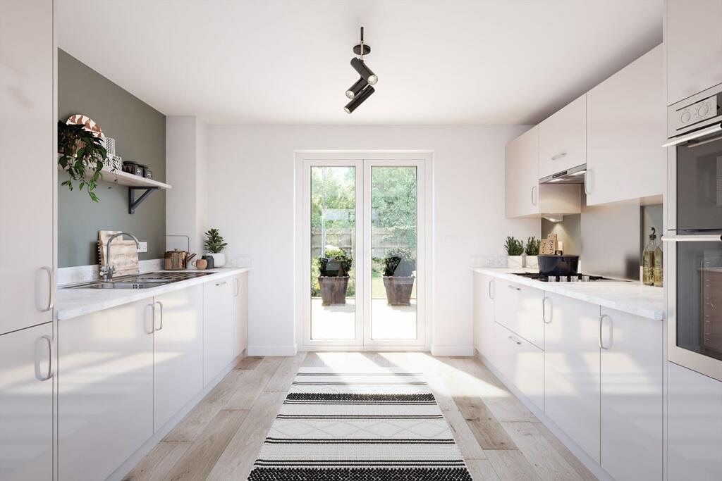 A bright and modern kitchen with ample storage space