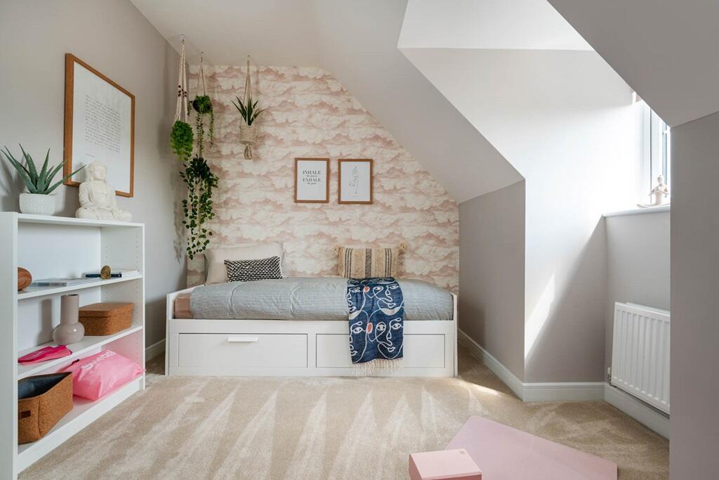 Guest bedroom, studio or playroom? Bedroom four on the top floor suits everyone