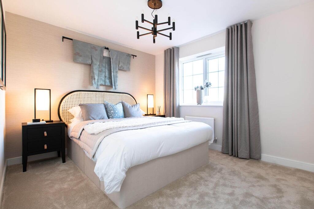 The main bedroom offers a place to unwind away from the rest of the home