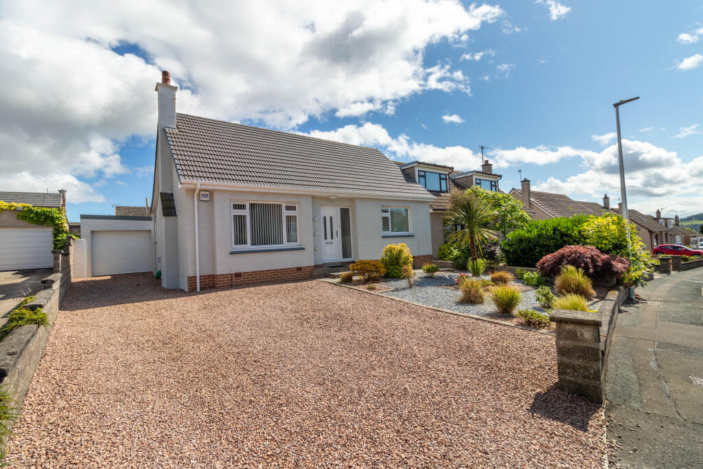 Front Elevation, Drive And Garage