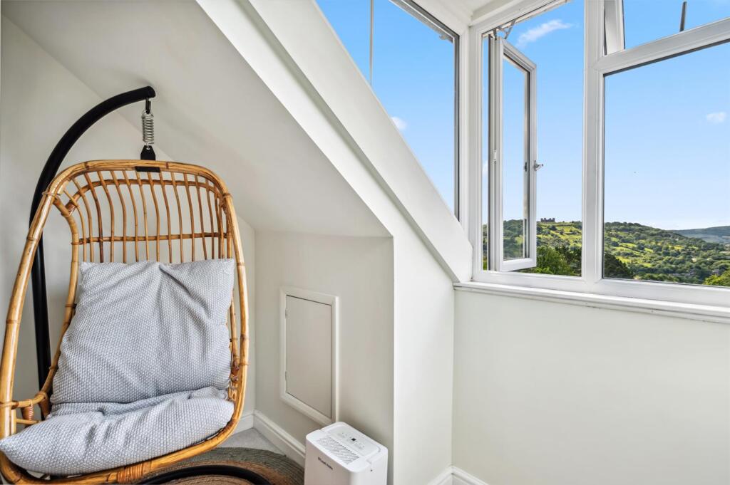 Bedroom Three - chair and window.jpg