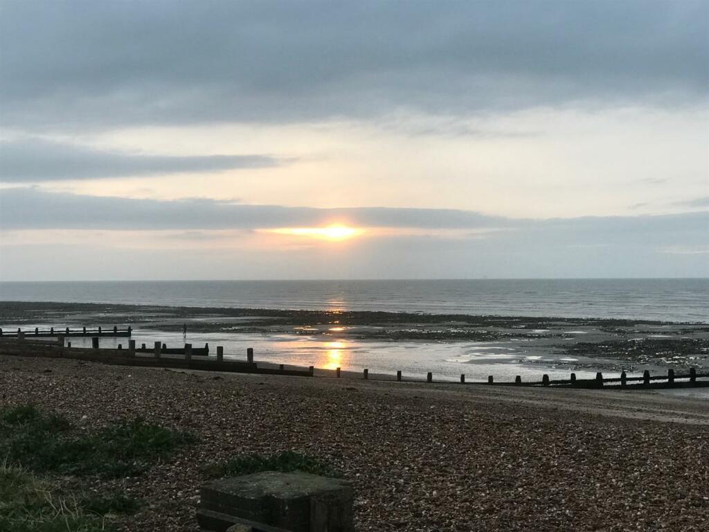 THE BEACH AT THE BOTTOM OF SEA LANE