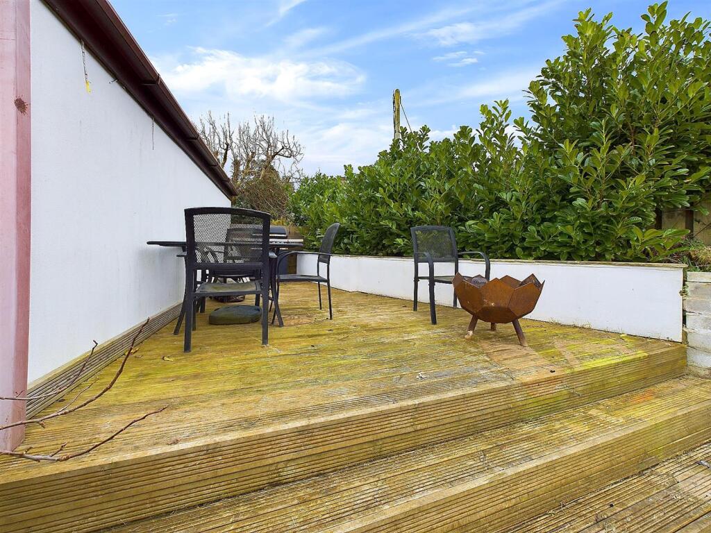 Decking next to garage