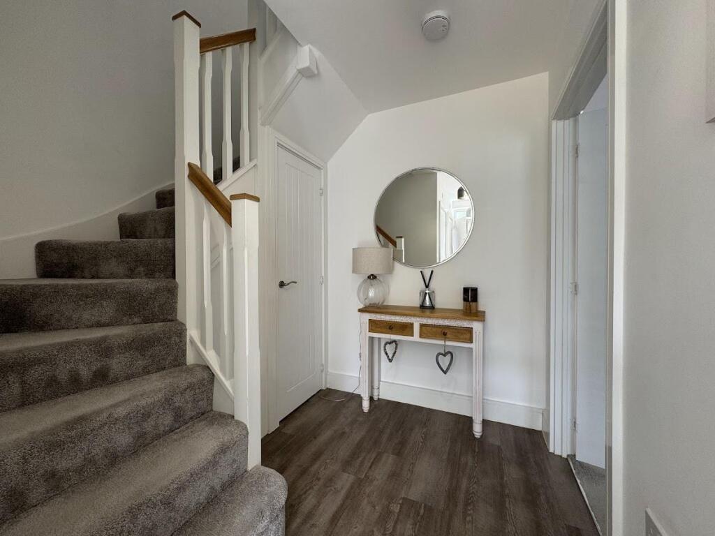 ENTRANCE HALLWAY AND RECEPTION